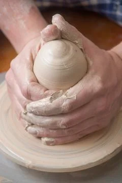 Hands of a potter Stock Photos