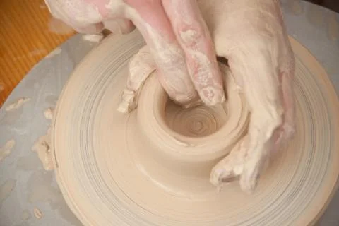 Hands of a potter Stock Photos