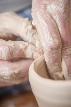 Hands of a potter Stock Photos
