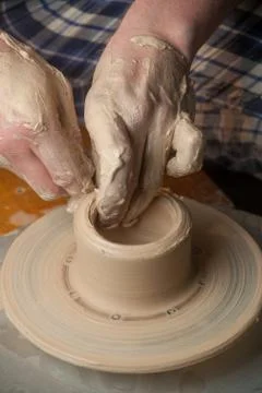 Hands of a potter Stock Photos