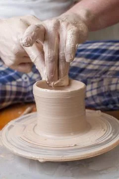 Hands of a potter Stock Photos