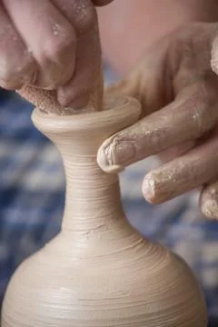 Hands of a potter Stock Photos