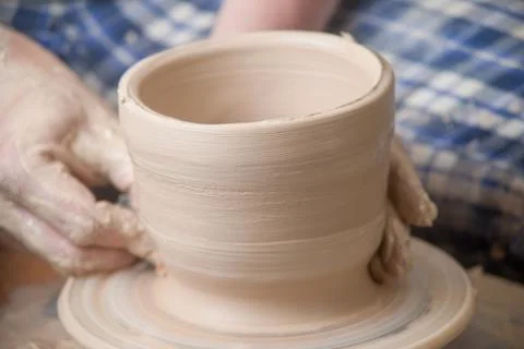 Hands of a potter Stock Photos