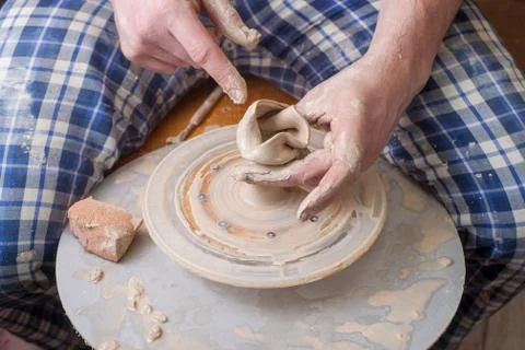 Hands of a potter Stock Photos