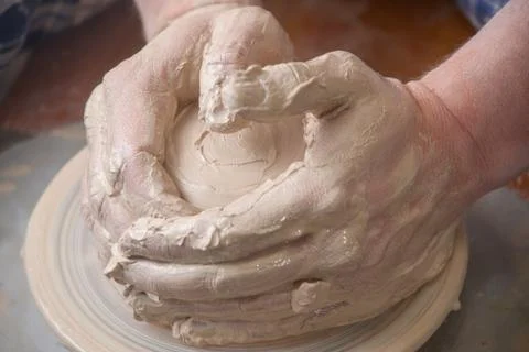 Hands of a potter Stock Photos
