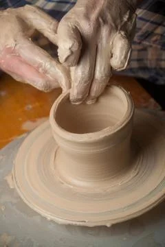 Hands of a potter Stock Photos