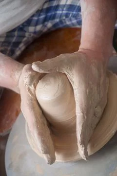 Hands of a potter Stock Photos