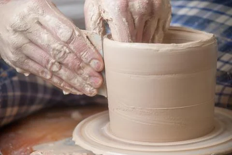Hands of a potter Stock Photos