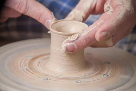 Hands of a potter Stock Photos