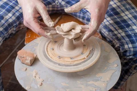 Hands of a potter Stock Photos