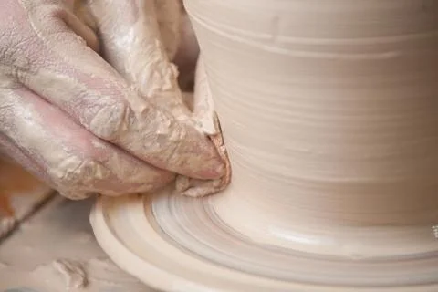 Hands of a potter Stock Photos