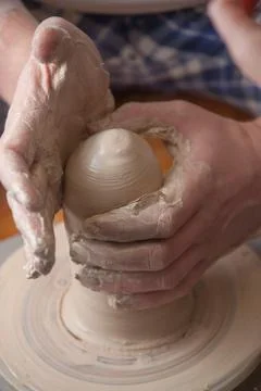 Hands of a potter Stock Photos