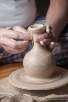 Hands of a potter Stock Photos