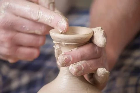Hands of a potter Stock Photos