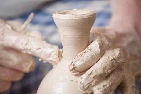 Hands of a potter Stock Photos