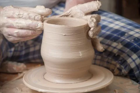 Hands of a potter Stock Photos