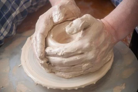 Hands of a potter Stock Photos