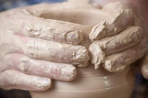 Hands of a potter Stock Photos