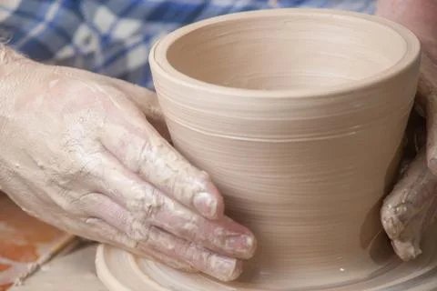 Hands of a potter Stock Photos