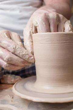 Hands of a potter Stock Photos