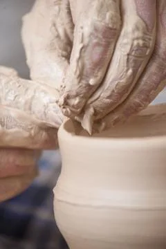 Hands of a potter Stock Photos