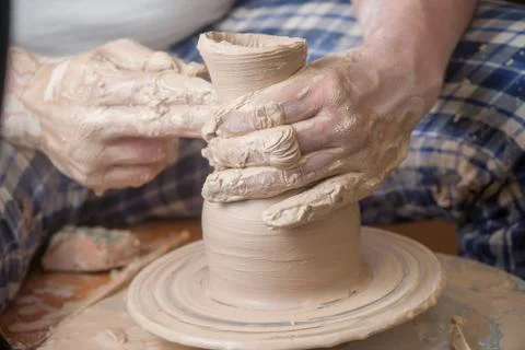 Hands of a potter Stock Photos