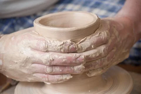 Hands of a potter Stock Photos