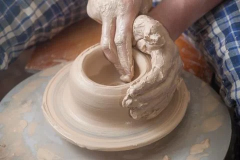Hands of a potter Stock Photos