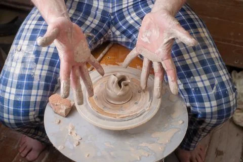 Hands of a potter Stock Photos