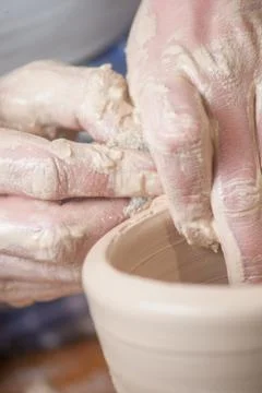 Hands of a potter Stock Photos
