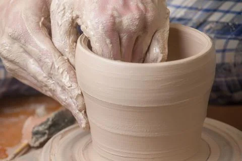 Hands of a potter Stock Photos