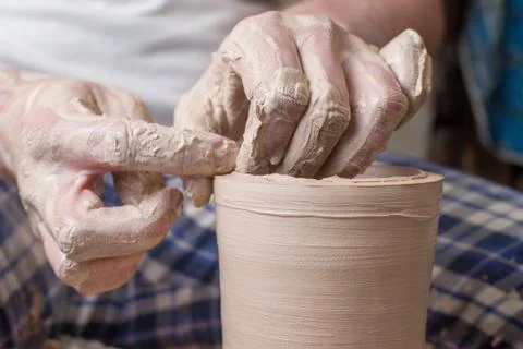 Hands of a potter Stock Photos
