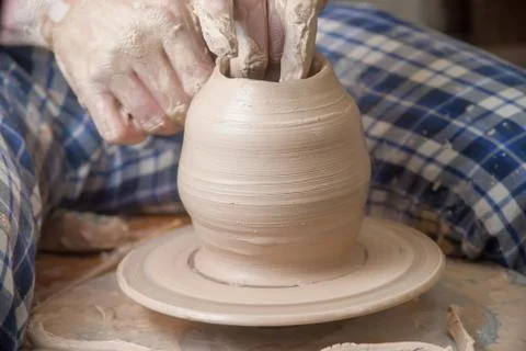 Hands of a potter Stock Photos