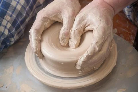 Hands of a potter Stock Photos