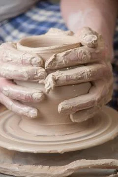 Hands of a potter Stock Photos