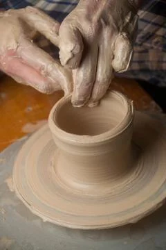 Hands of a potter Stock Photos