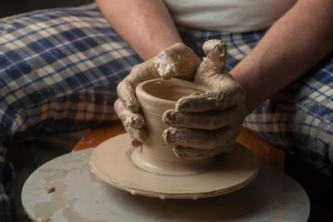 Hands of a potter Stock Photos