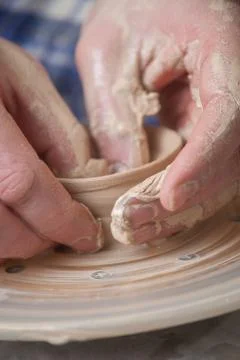 Hands of a potter Stock Photos