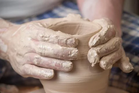 Hands of a potter Stock Photos