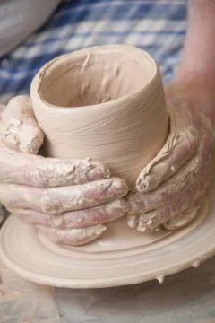 Hands of a potter Stock Photos