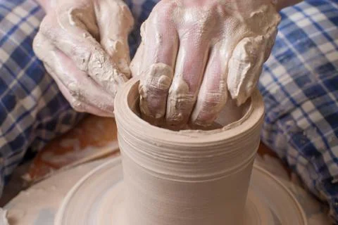 Hands of a potter Stock Photos