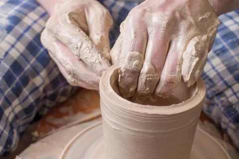 Hands of a potter Stock Photos