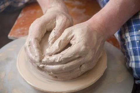 Hands of a potter Stock Photos