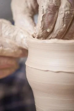 Hands of a potter Stock Photos