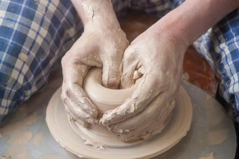 Hands of a potter Stock Photos