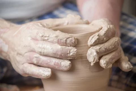 Hands of a potter Stock Photos