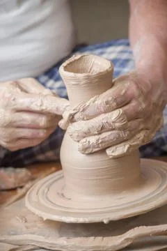 Hands of a potter Stock Photos
