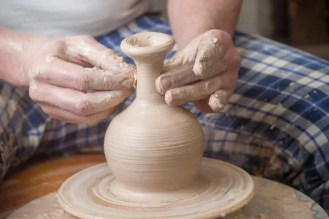 Hands of a potter Stock Photos