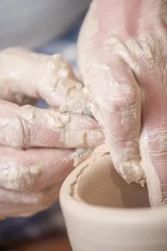 Hands of a potter Stock Photos