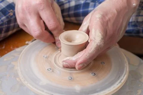 Hands of a potter Stock Photos